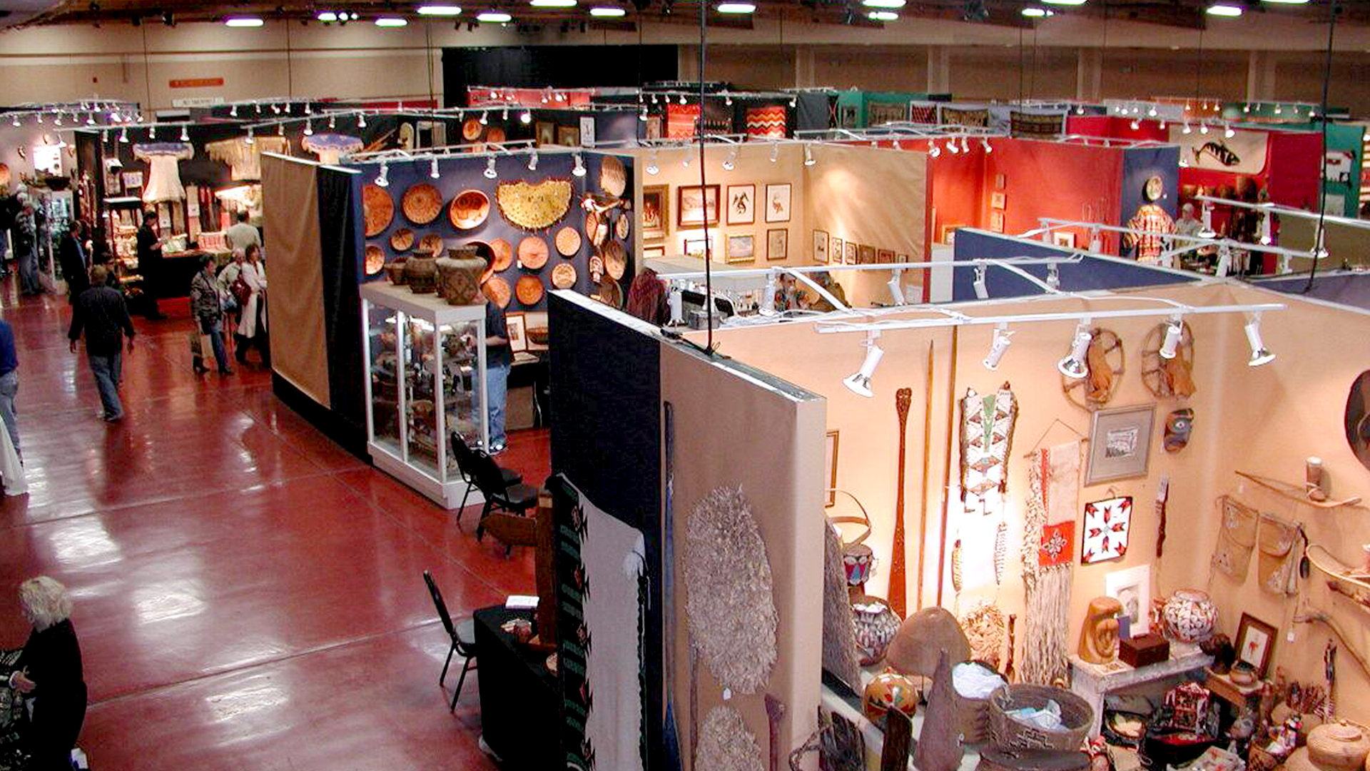 Interior of Exhibit Hall with booths set up for a trade show