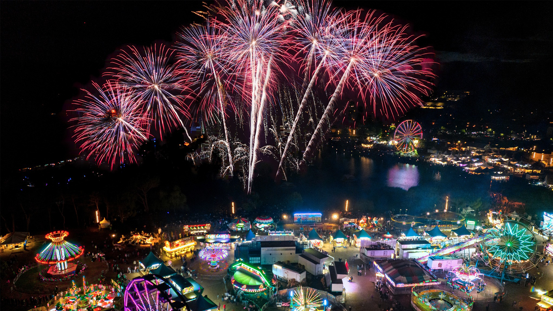 Fireworks explode over the Civic Center Lagoon