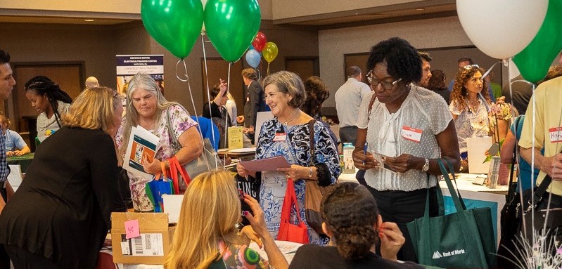People mingle at a job fair.