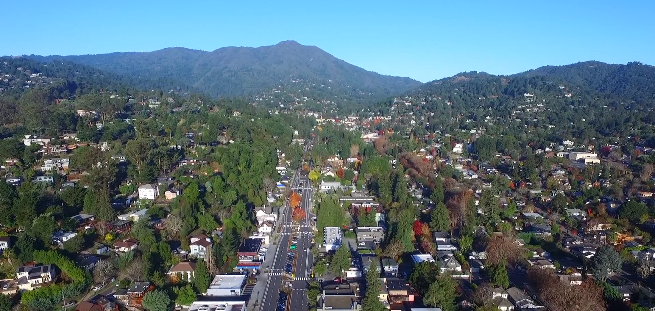 An aerial view of downtown Mill Valley with Mt. Tamalpais in the background