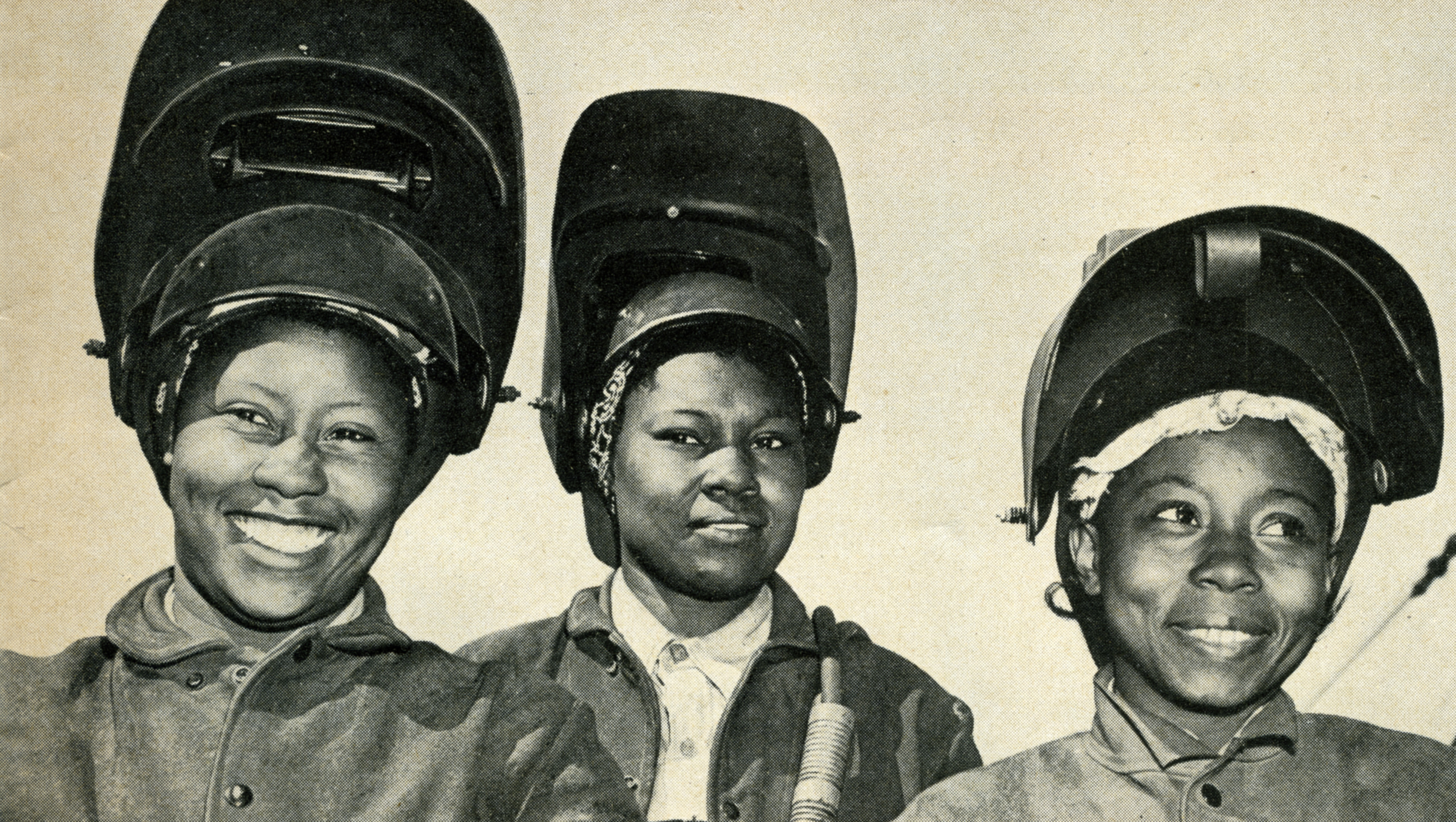 A photo of three African American women wearing riveter helmets during World War II while working at Marinship in Sausalito.