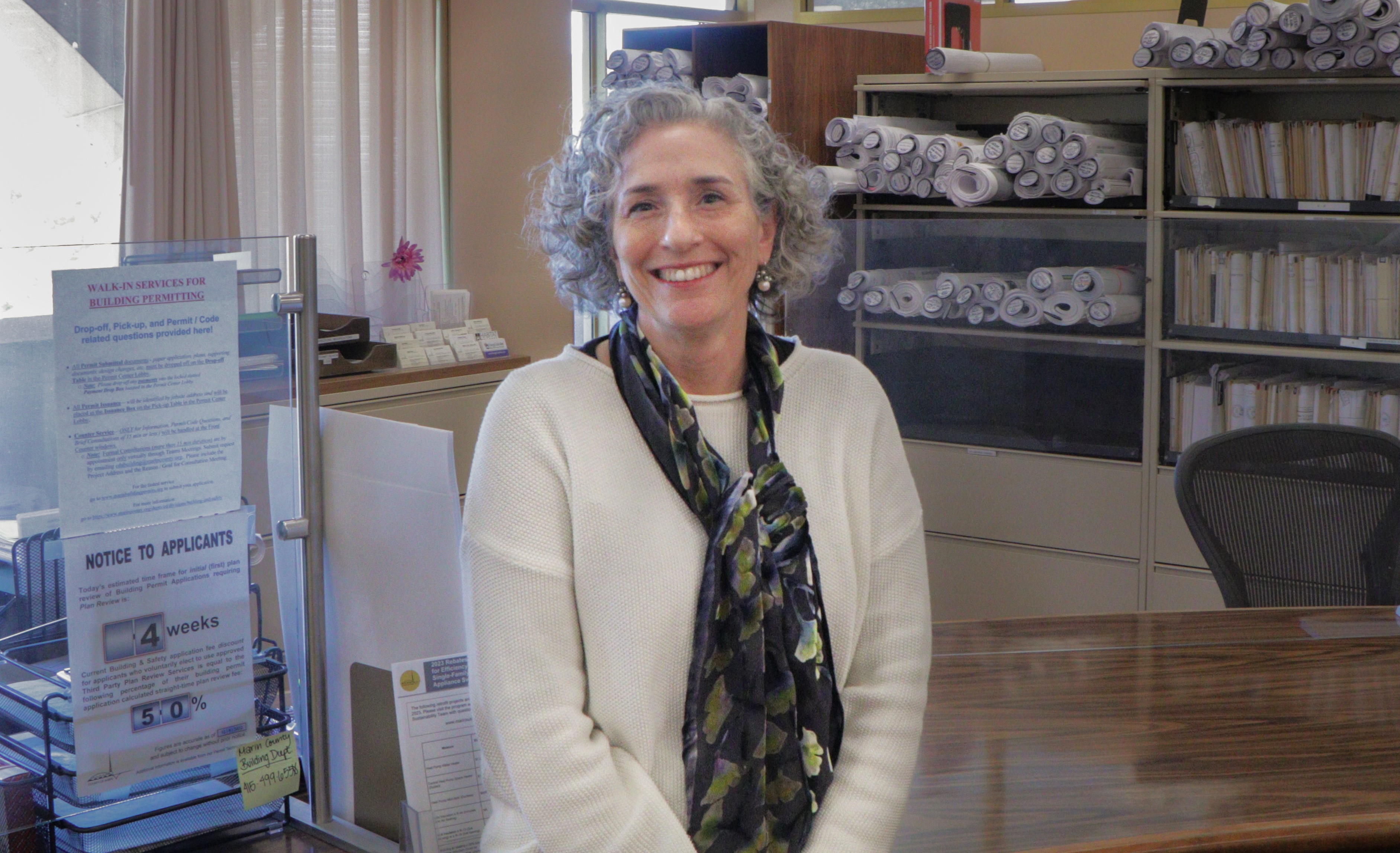 Sarah Jones smiles in the Building and Planning Division office.