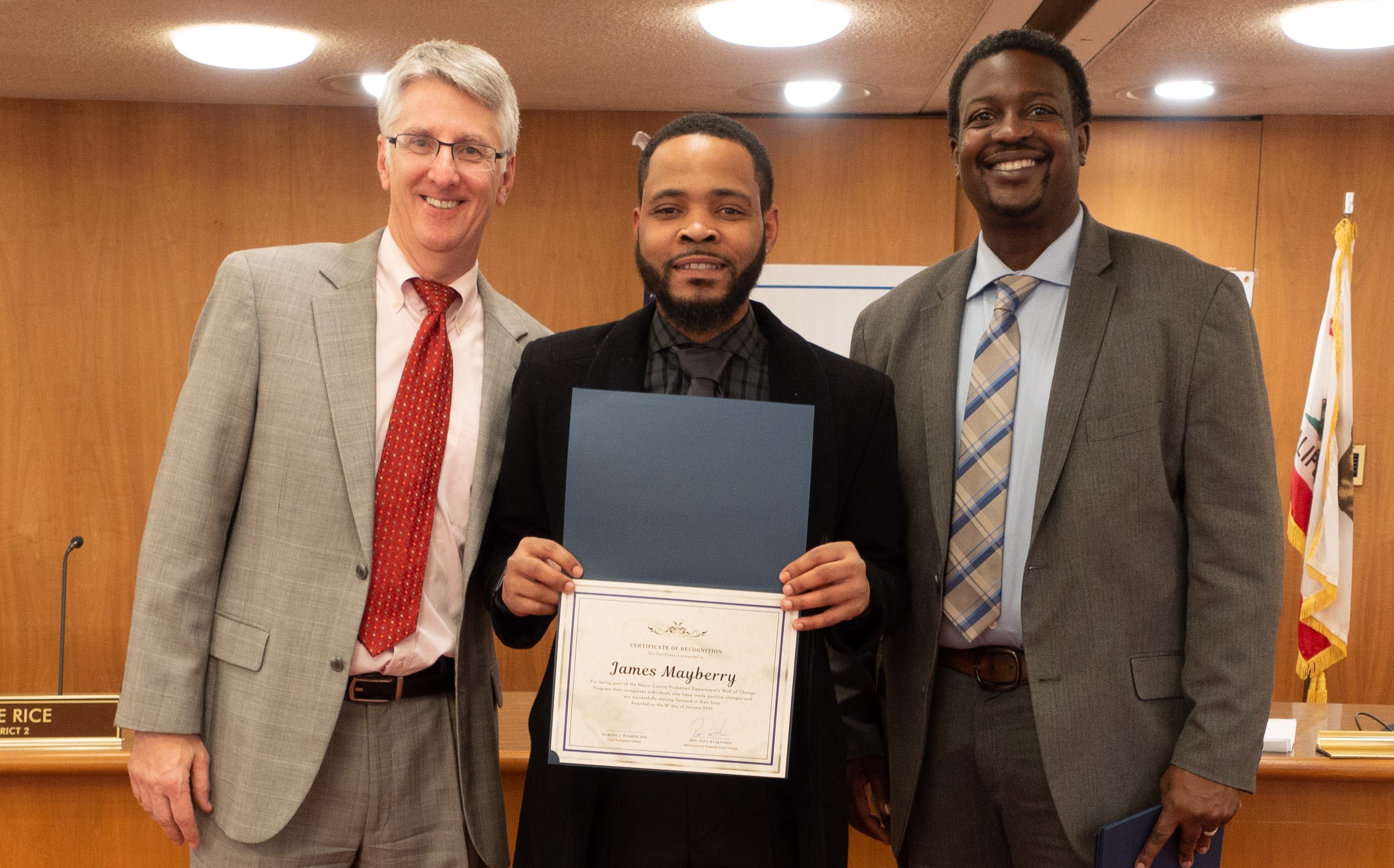 James Mayberry receives his certificate during the Wall of Change ceremony.