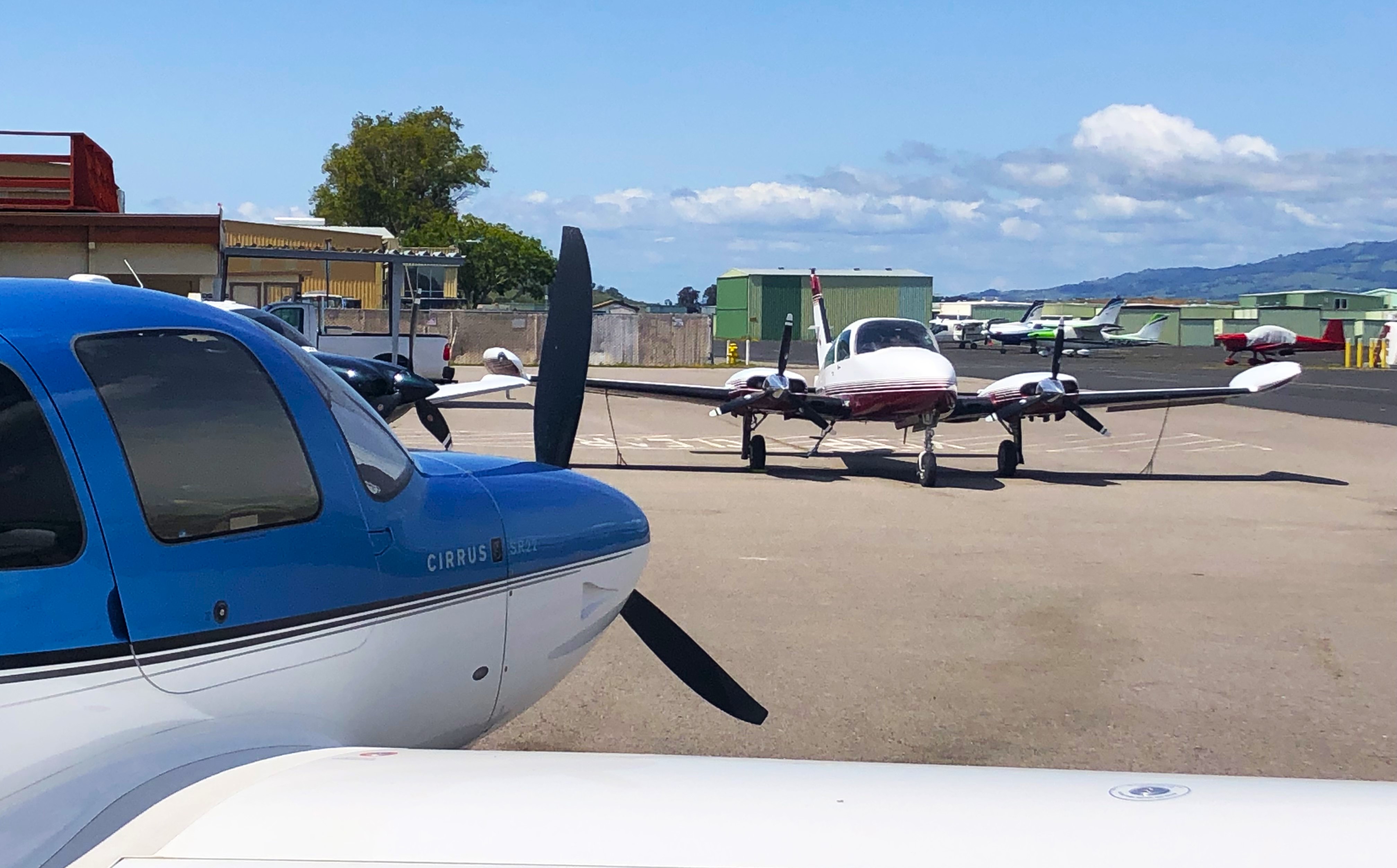 Airplaines parked on the tarmac at Gnoss Field.