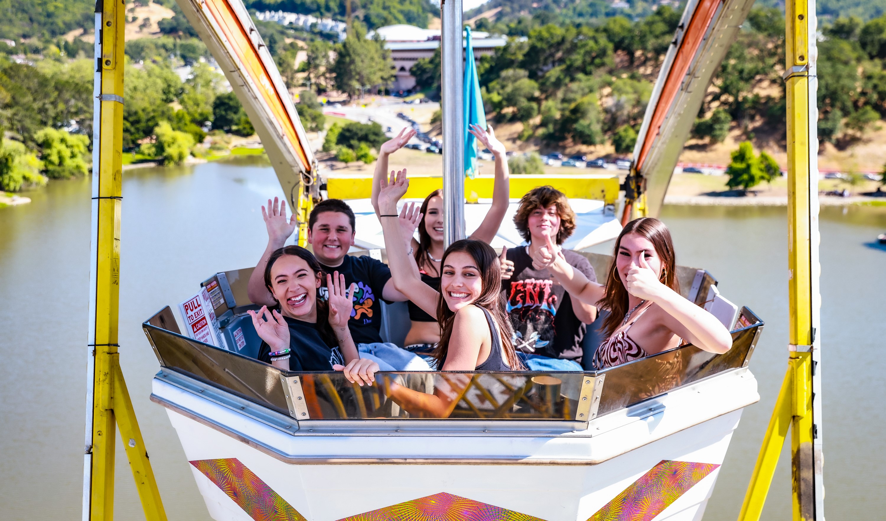 Six teens enjoy a ferris wheel ride at the Marin County Fair.
