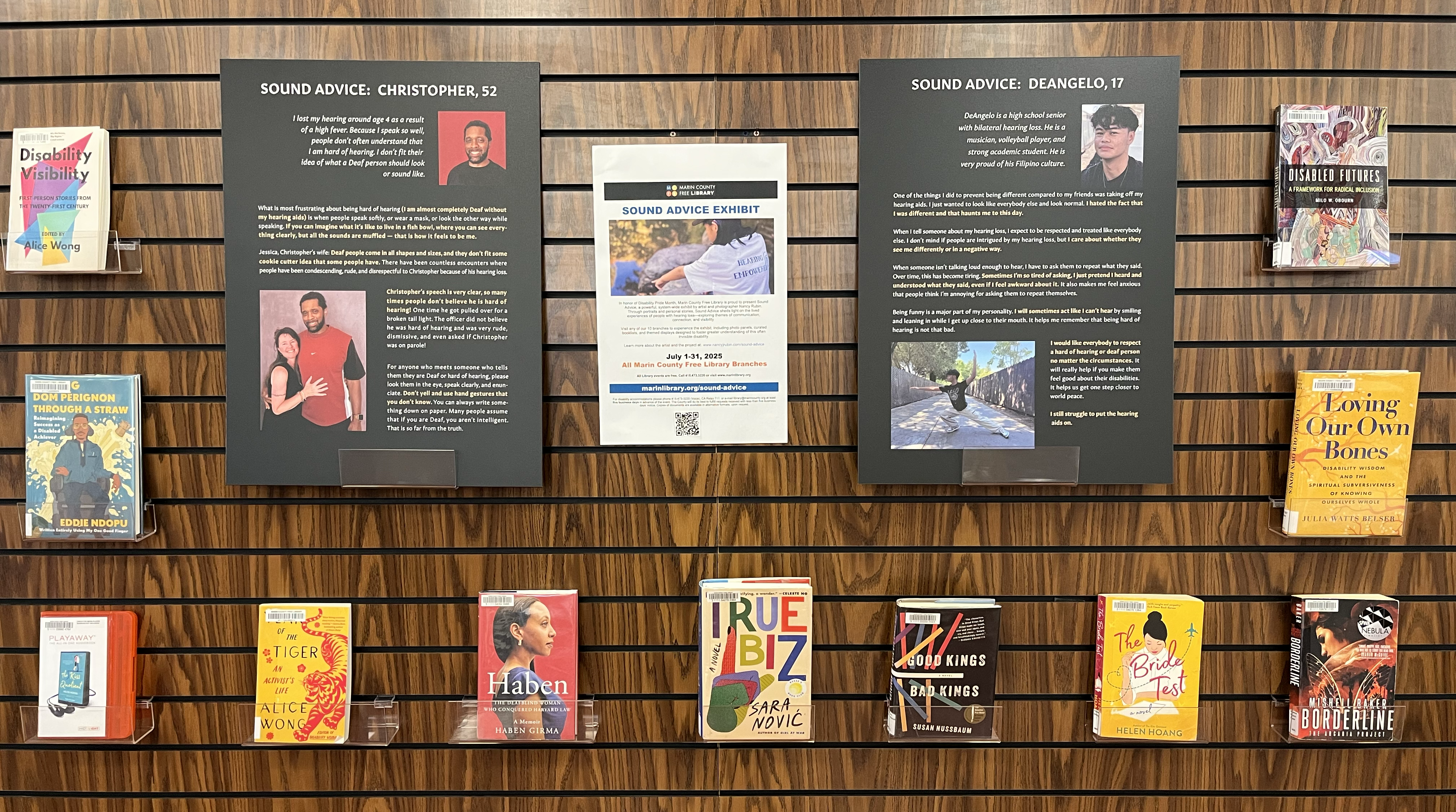 A display of disability information on the interior wall of a library branch.