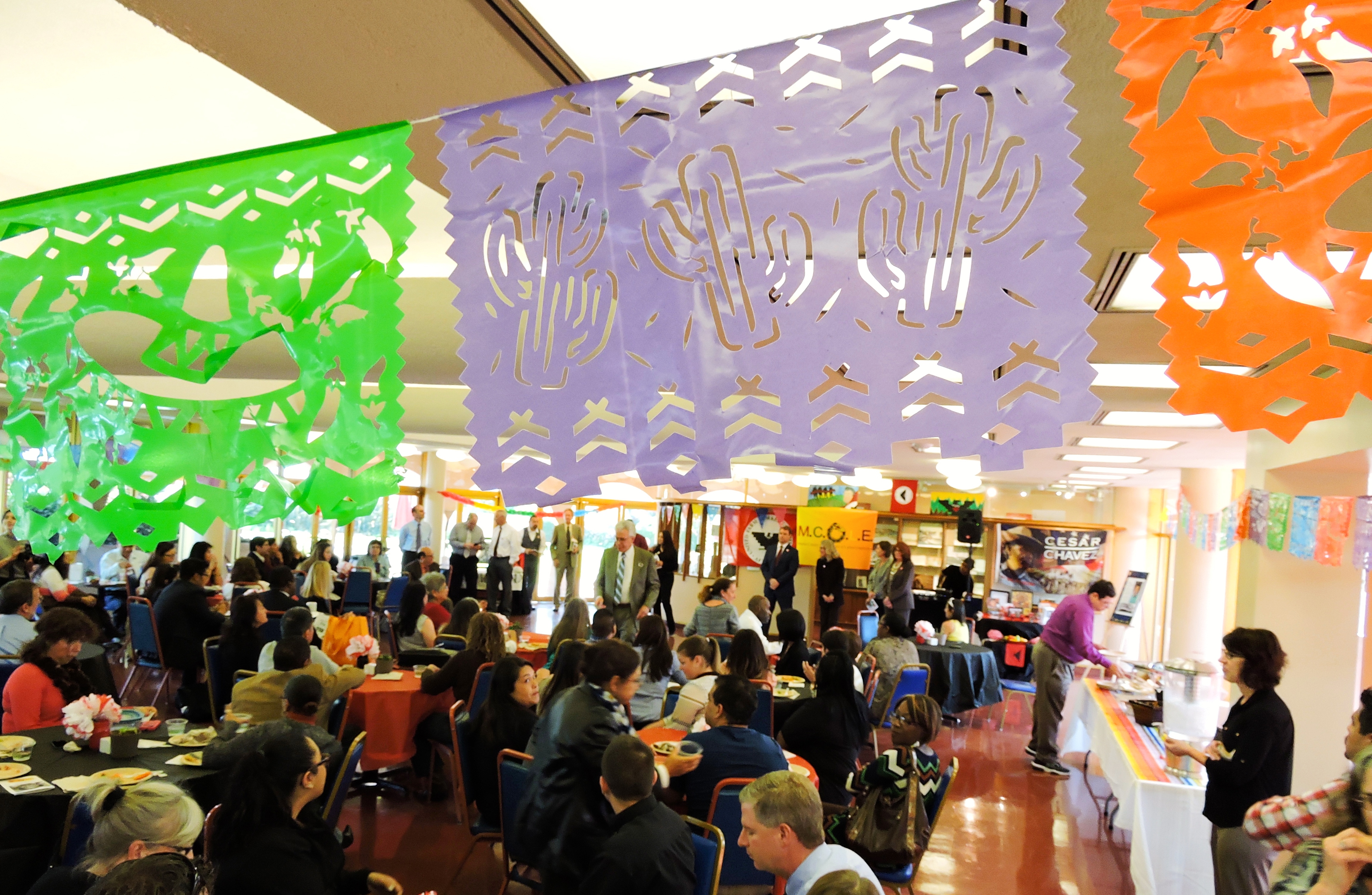 Dozens of people are shown at a Latin Heritage event at the Marin County Civic Center.