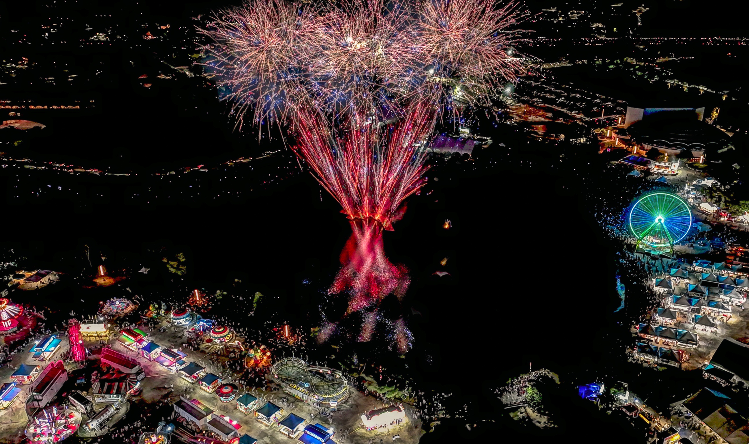 An aerial nighttime view of fireworks going off at the Marin County Fair.