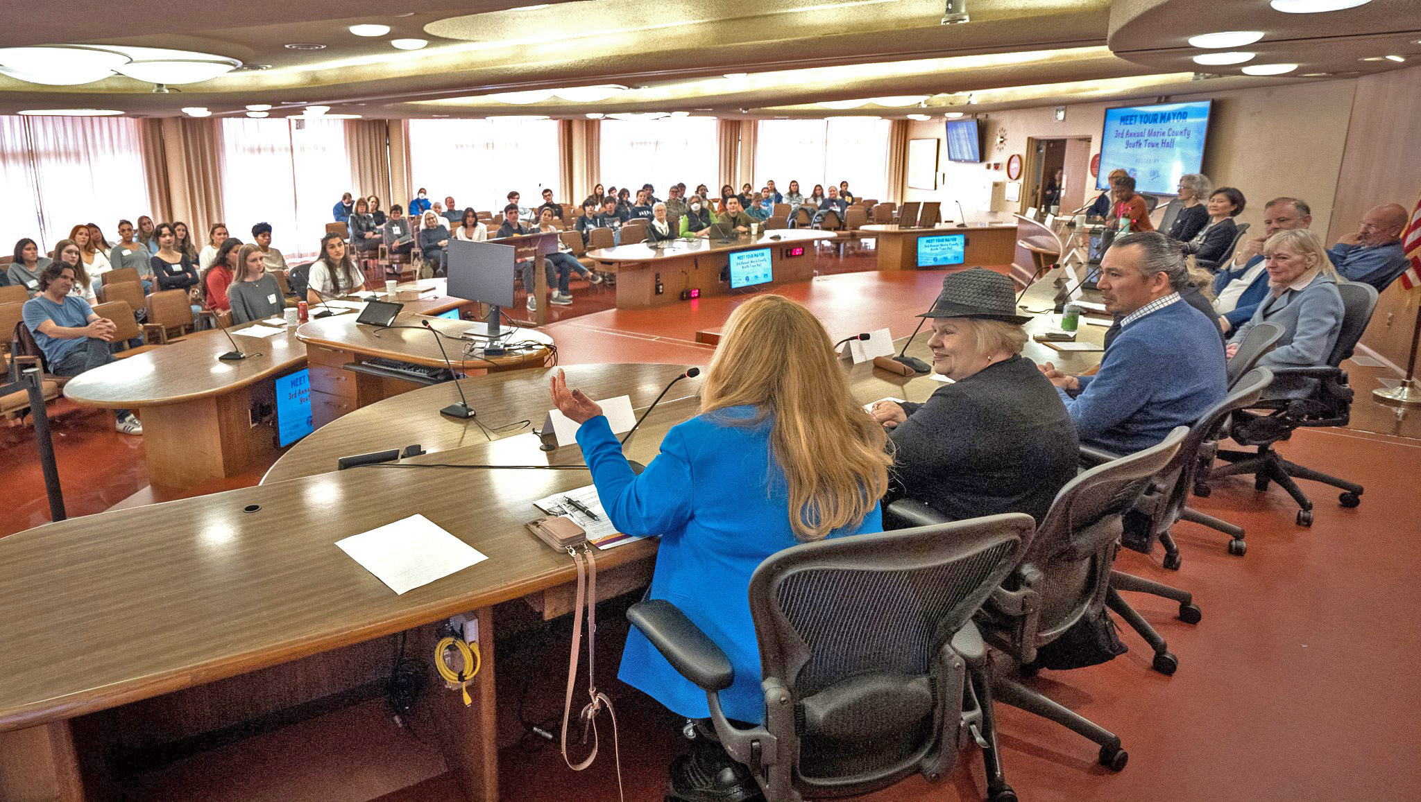 A crowd of several hundred participates in the 2025 Youth Town Hall in the Board of Supervisors chamber.