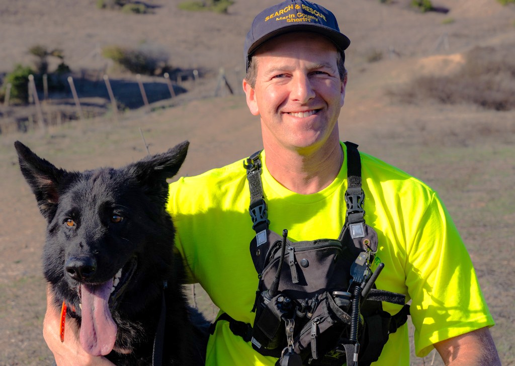 Portrait of Gideon Bernstein and his Search and Rescue KP Bruce.