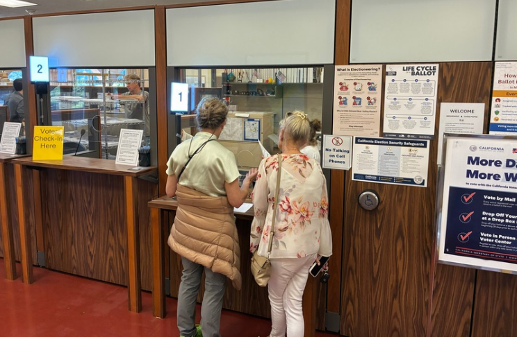 People visit a vote center at the Marin County Civic Center.