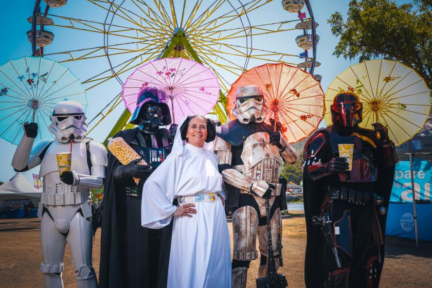 Members of the Galactic Creations Initiative volunteer costuming collective, dressed as classic Star Wars characters.