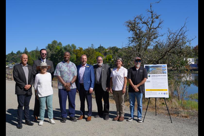 Marin County officials standing next to the Lower College of Marin Restoration Project and celebrate the completion of the project.