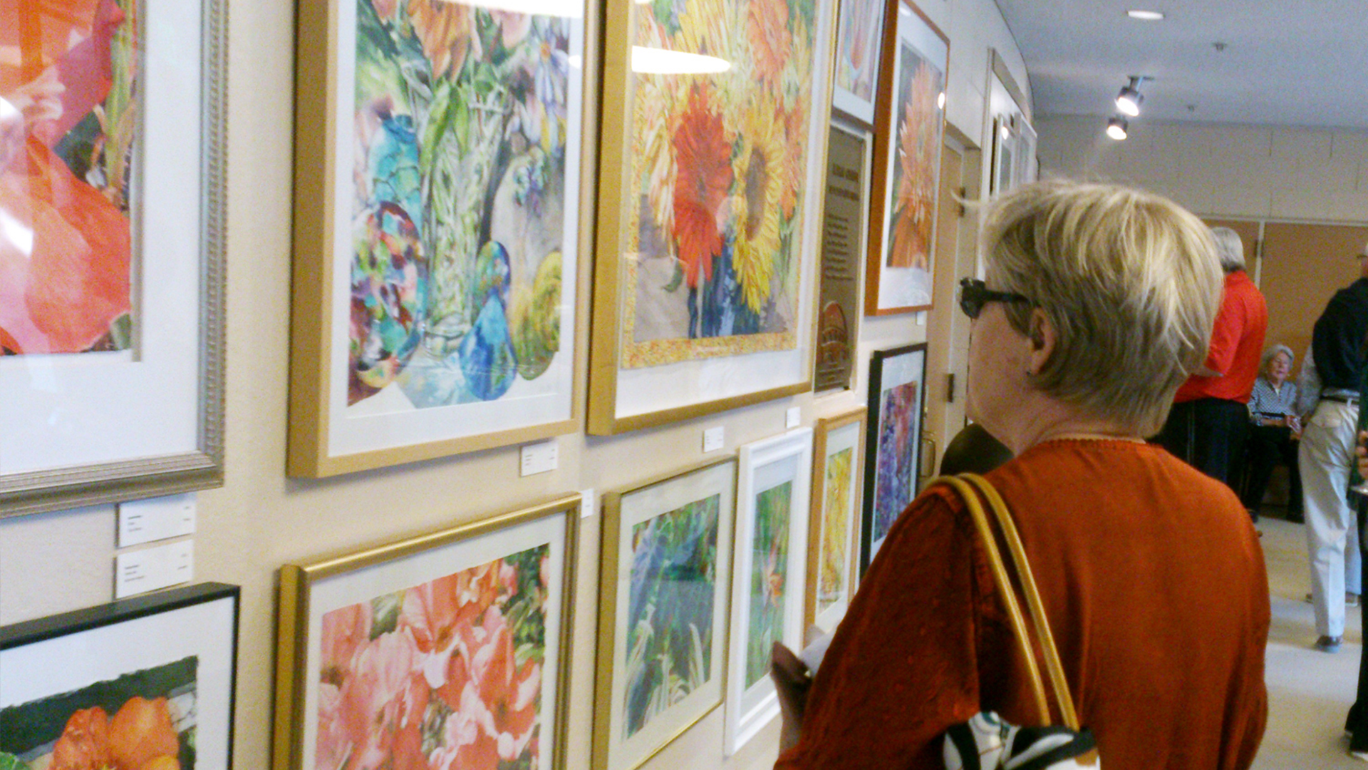 Visitors viewing art work in the Bartolini Gallery.