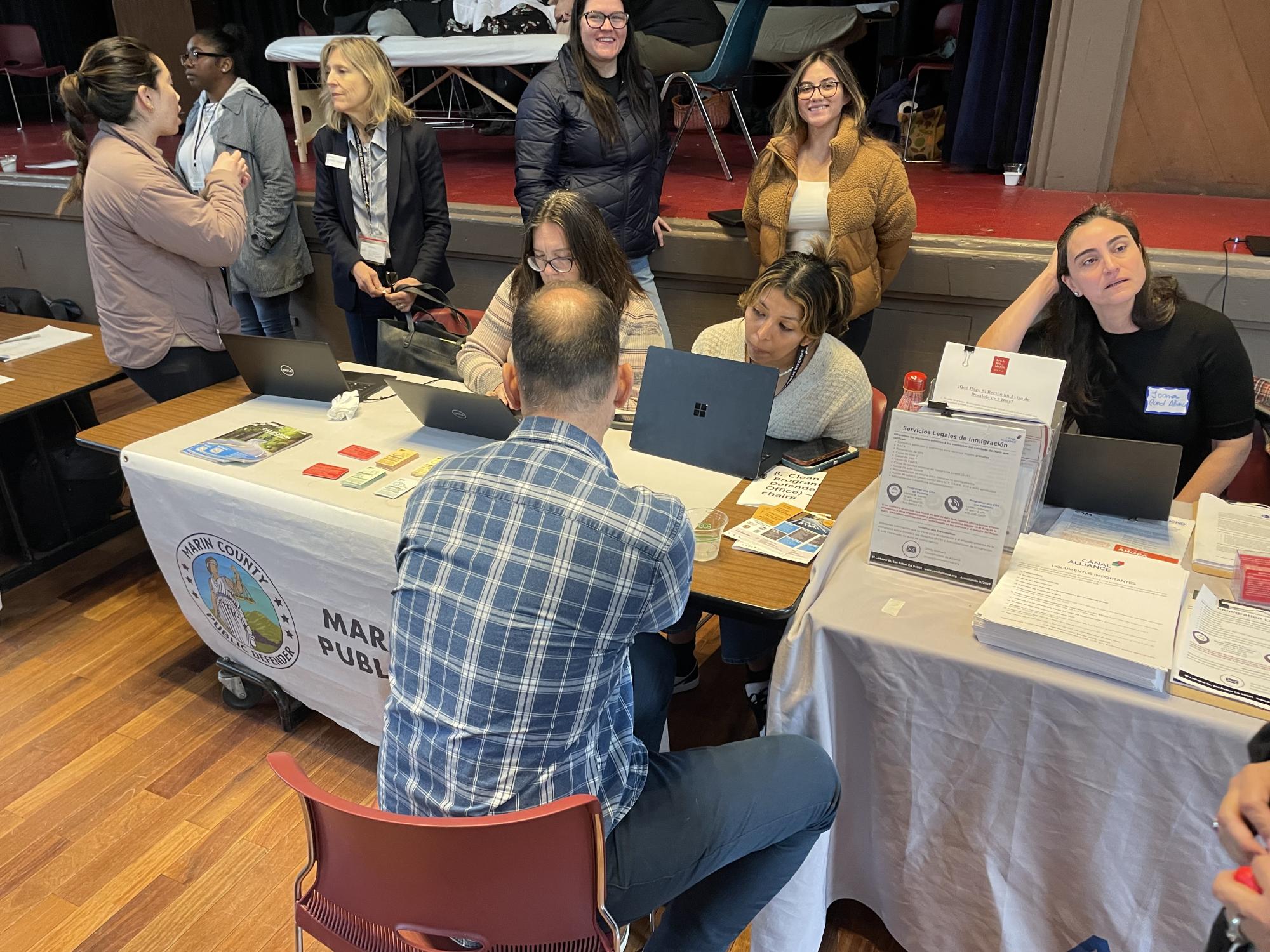 Public Defender staff tabling at the Seeds of Hope event.