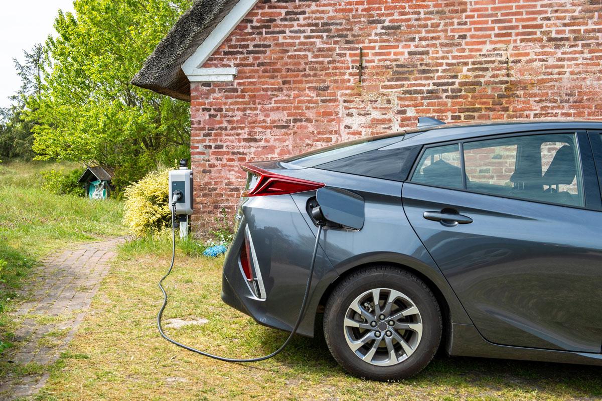 A car is charged at a residence.