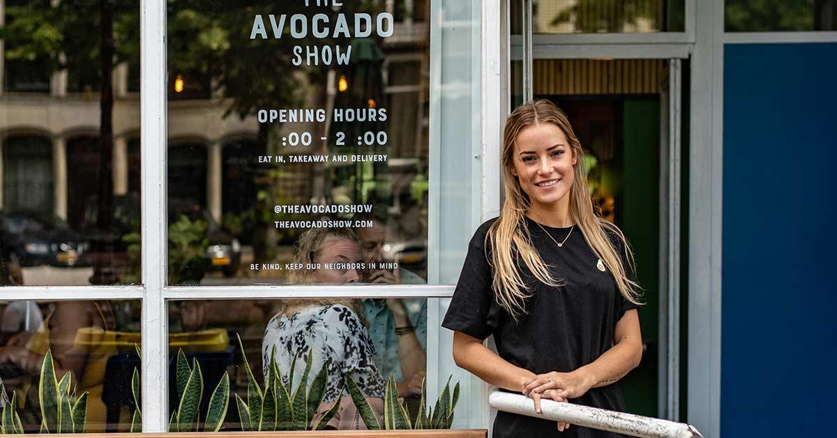restaurant owner holding plans