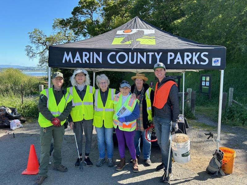 Eric Lucan with volunteers at Rush Creek Preserve clean-up. 