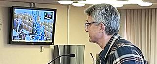 Man speaking at a Parks board meeting