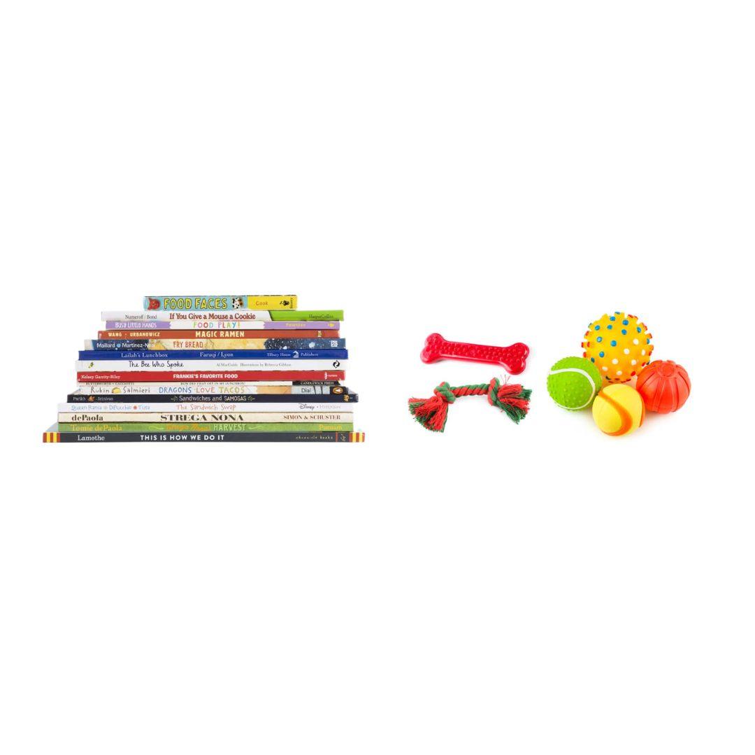 A stack of kids' books and some pet toys.